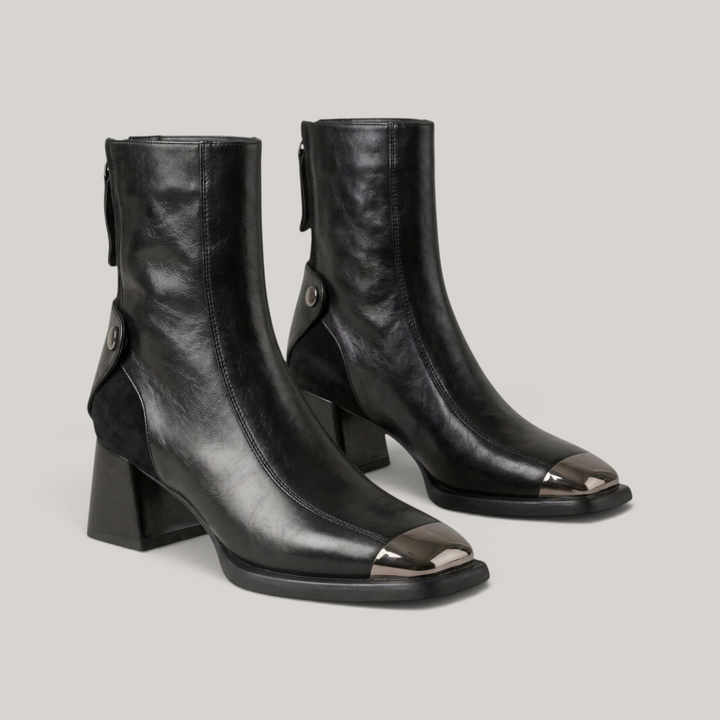 USS® Shoes Valenne black cowhide leather ankle boots with a square toe, metallic cap, and sculpted block heel.