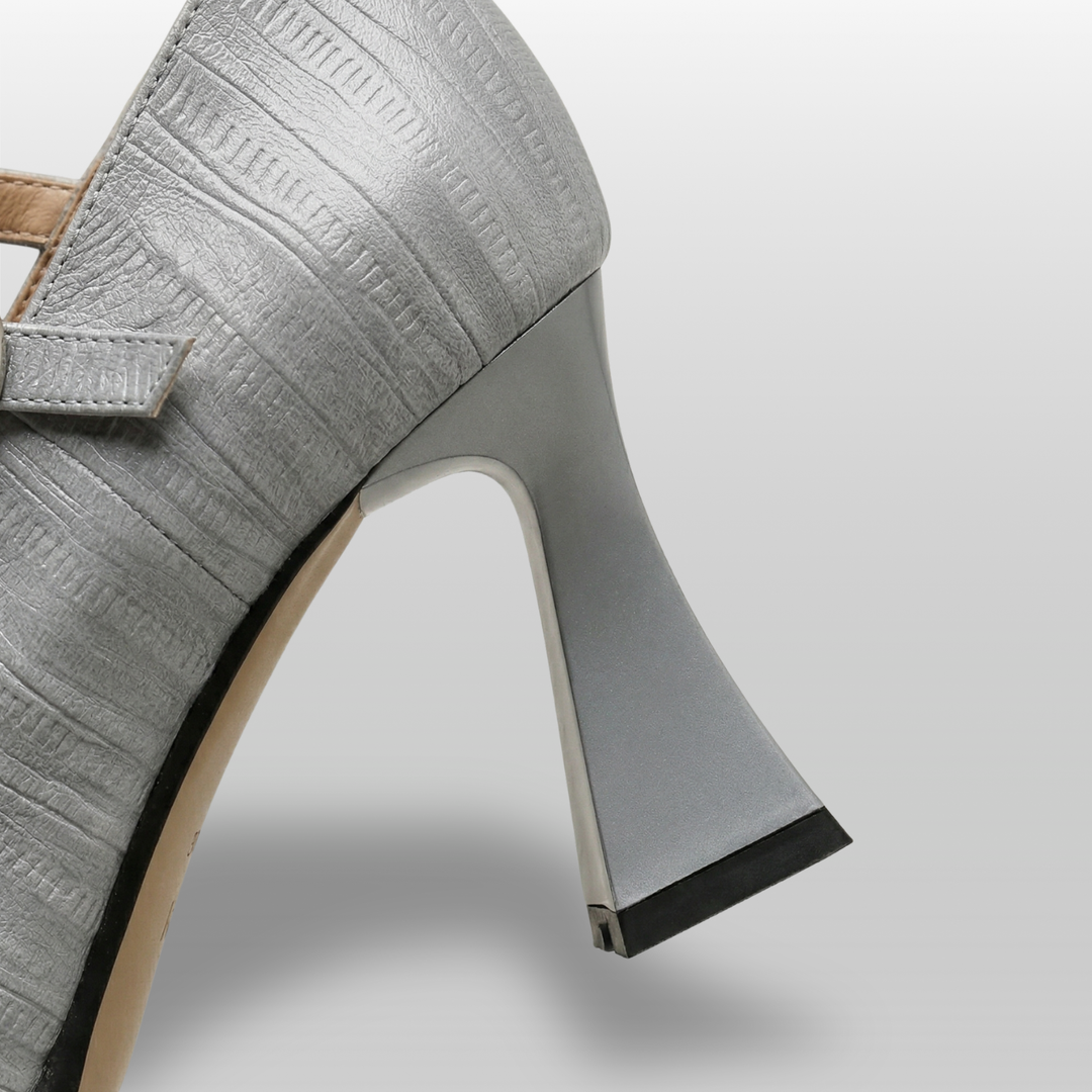 Gray high-heeled shoe on a light gray background