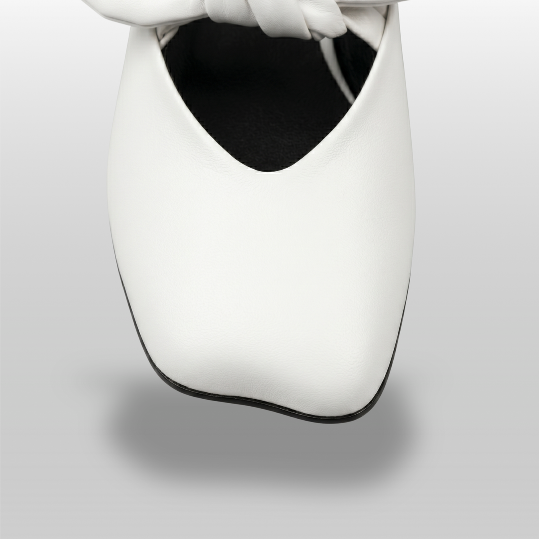 Bianca Knot Mule in Bianco Latte toe detail with three-dimensional sculptural leather knot and soft square toe