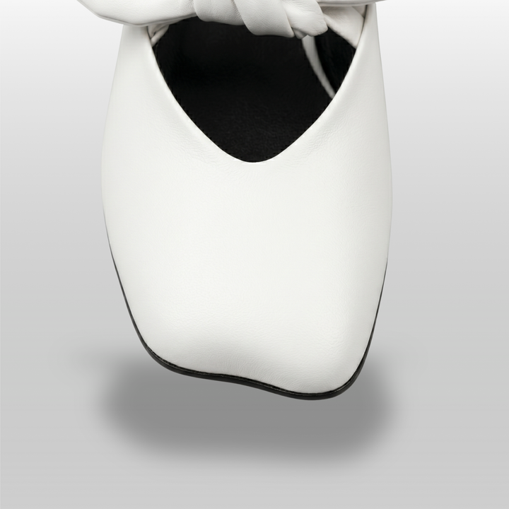 Bianca Knot Mule in Bianco Latte toe detail with three-dimensional sculptural leather knot and soft square toe