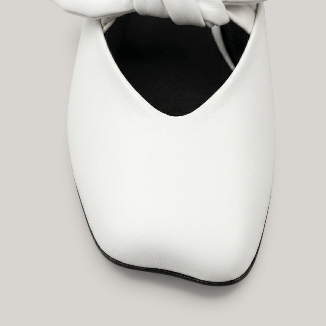 Bianca Knot Mule in Bianco Latte toe detail with three-dimensional sculptural leather knot and soft square toe