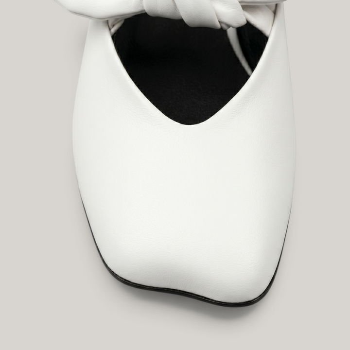 Bianca Knot Mule in Bianco Latte toe detail with three-dimensional sculptural leather knot and soft square toe