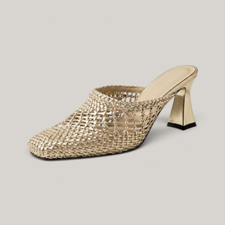 Dorée Mule in Or Tissé. Open-mesh metallic woven mule with square toe and a sculptural 7.5cm trapezoidal block heel in warm gold.