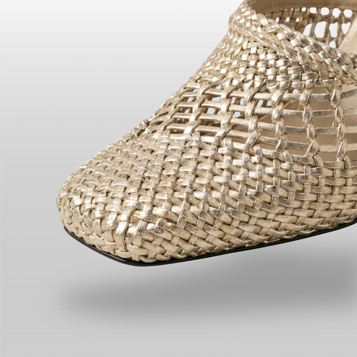 Dorée Mule in Or Tissé. Close detail of the open metallic gold woven cord construction and nude cowhide insole.