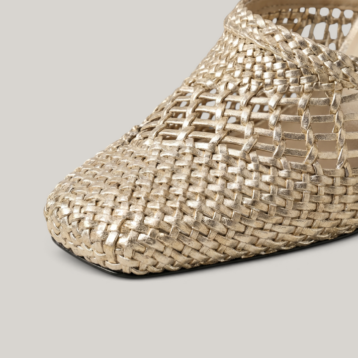 Dorée Mule in Or Tissé. Close detail of the open metallic gold woven cord construction and nude cowhide insole.