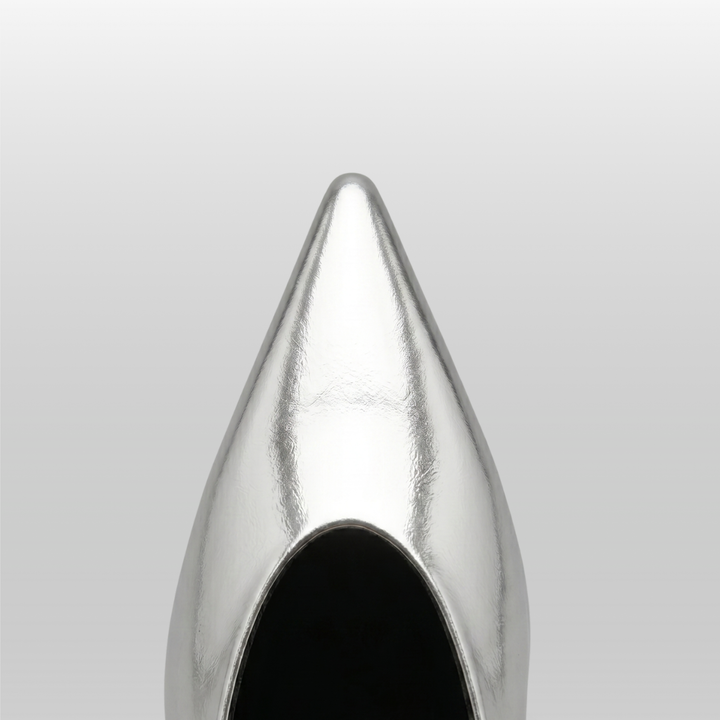 Top-down close-up of the pointed toe on the silver Argent Vif Lumière Mule in a metallic finish.