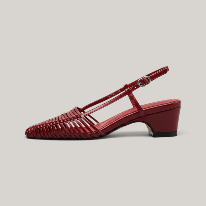 Margot Slingback in Rouge Claret. Hand-woven leather strips, sharply pointed toe, 4.5cm block heel and silver slingback buckle.