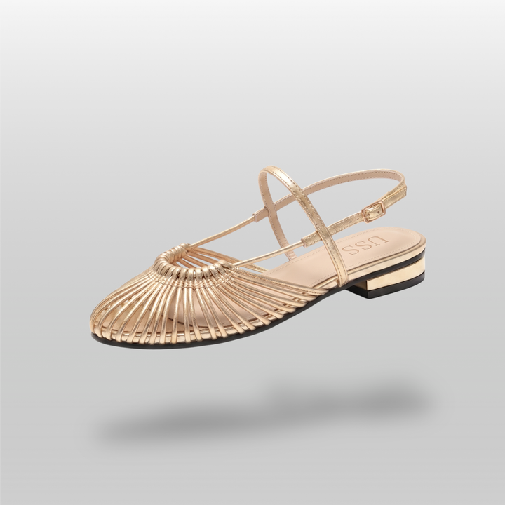 Gold woven leather flat sandal with sunburst vamp and ankle strap