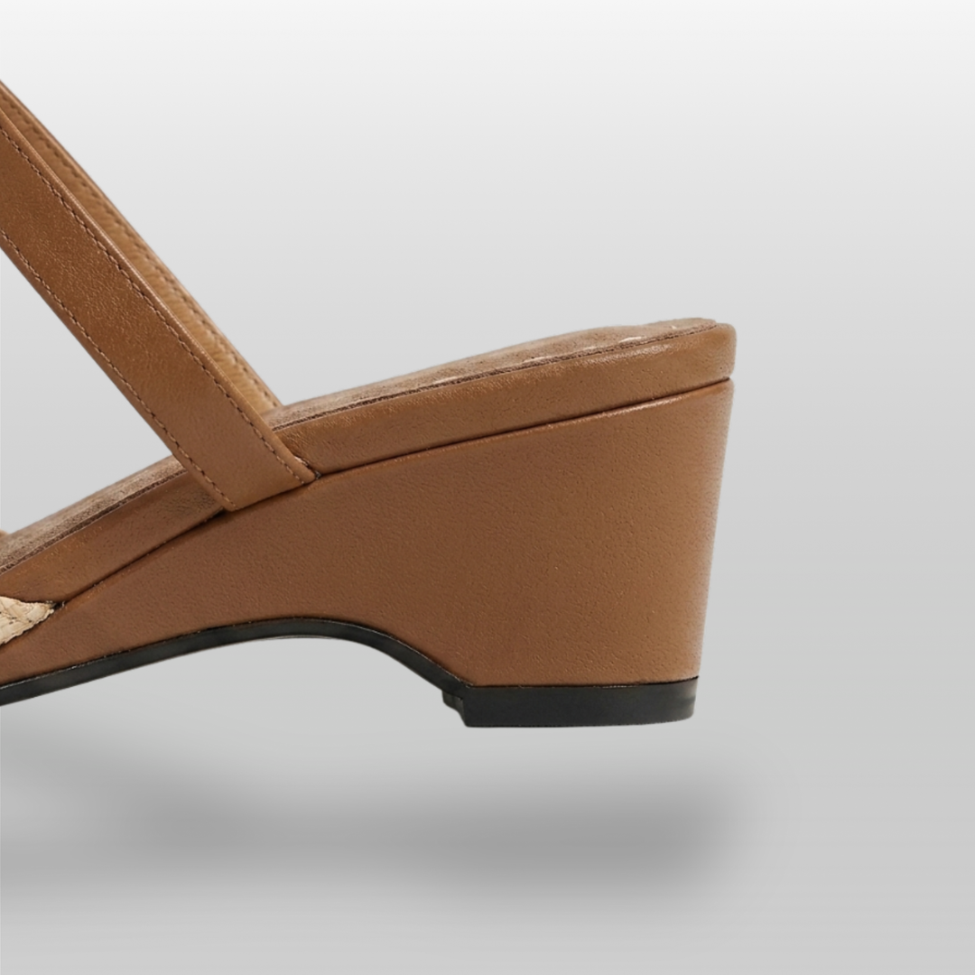 Paloma Mule in Sable Doré. Camel suede insole with white pick-stitching and continuous 3cm camel leather wedge heel.
