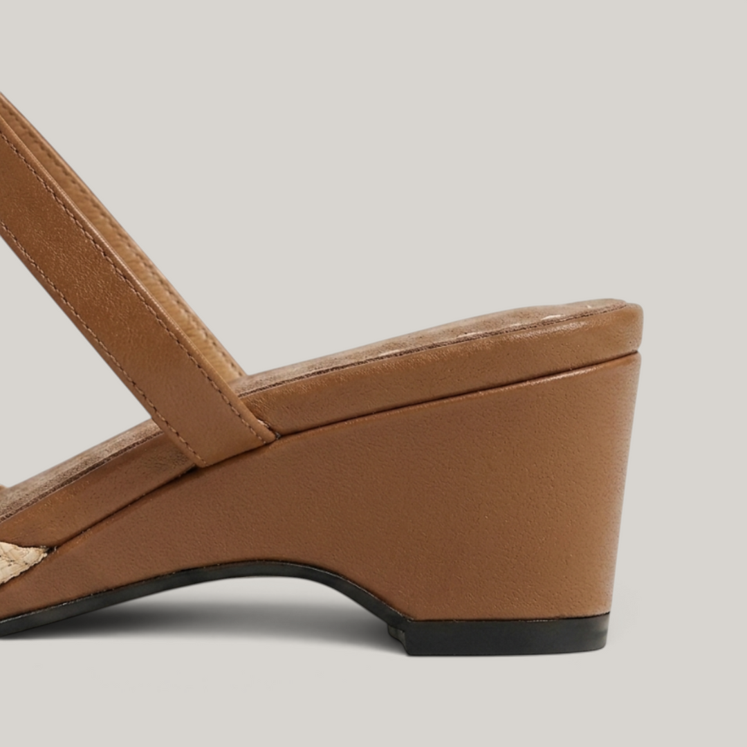 Paloma Mule in Sable Doré. Camel suede insole with white pick-stitching and continuous 3cm camel leather wedge heel.
