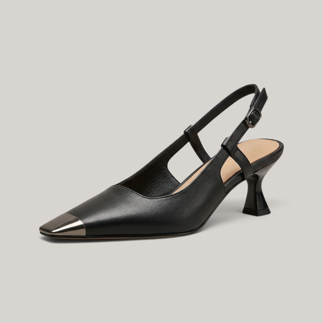 USS® Shoes Elowen black cowhide slingback heels with a square toe, metallic cap, and sculpted kitten heel.