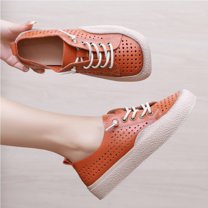 walking sneaker color orange size 8.5 for women