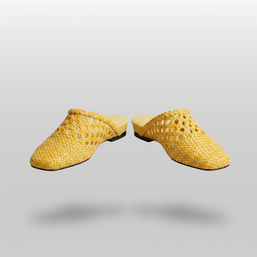 A pair of USS Sienna Soleil Yellow mules, minimalist Mediterranean style women&