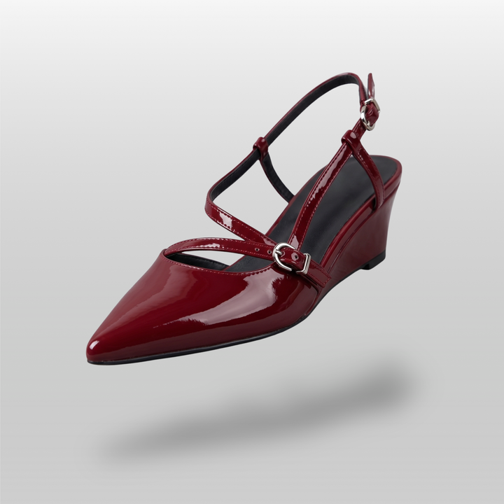 Valeria Slingback in Rouge Lacca — deep wine-red patent leather pointed toe slingback with dual crossed vamp straps and antique gold D-ring buckle hardware
