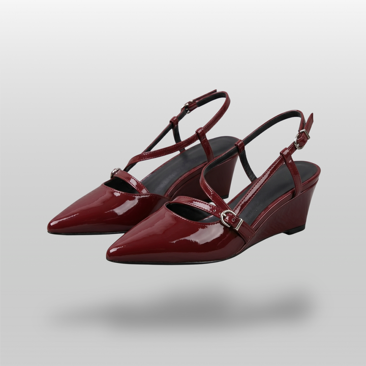 Valeria Slingback in Rouge Lacca pair shot — wine-red patent leather slingbacks in warm studio setting