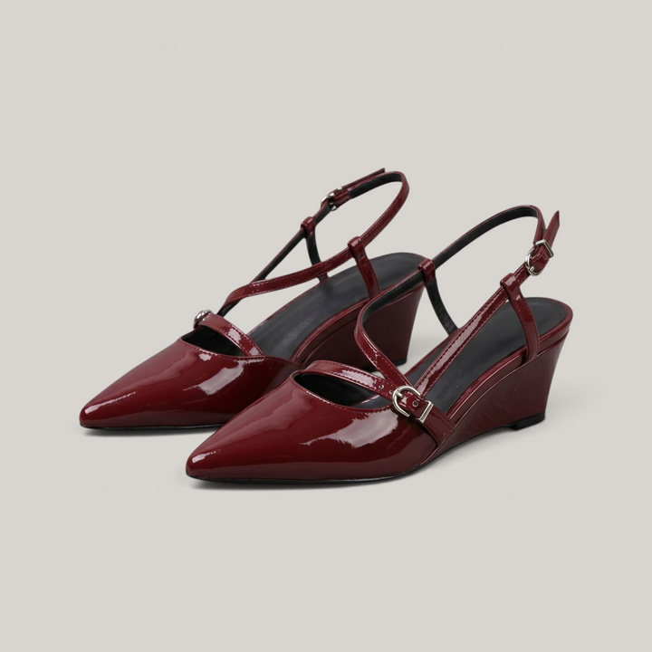 Valeria Slingback in Rouge Lacca pair shot — wine-red patent leather slingbacks in warm studio setting