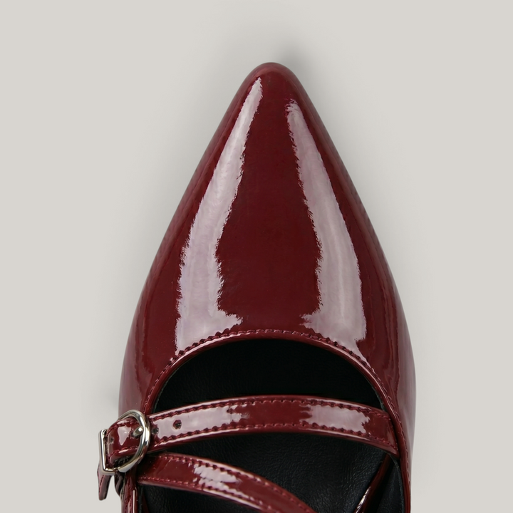 Valeria Slingback Rouge Lacca close-up toe detail showing patent leather lacquer finish and gold D-ring cross strap buckles