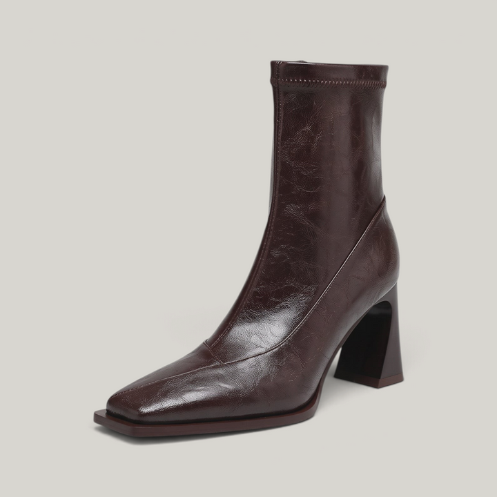 Vienne Bootie in Moka Ciré, a brown crinkled cowhide ankle boot with a square toe and sculpted flared heel