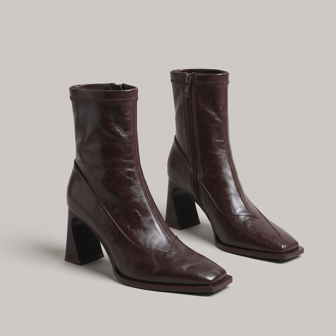 Pair of Vienne Bootie ankle boots in Moka Ciré glazed brown leather with square toes and inside zips