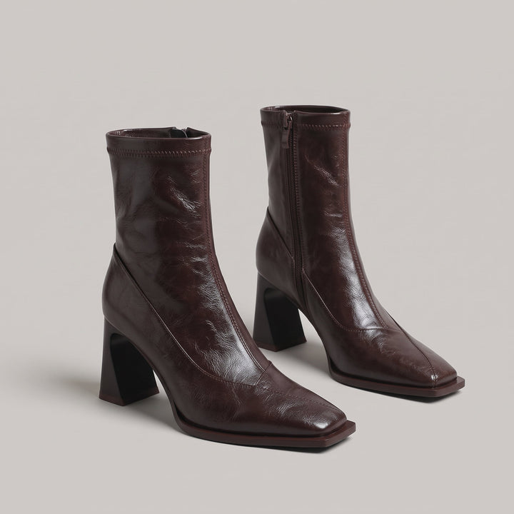 Pair of Vienne Bootie ankle boots in Moka Ciré glazed brown leather with square toes and inside zips
