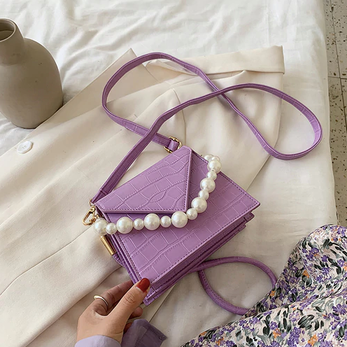 Conchita Handbags