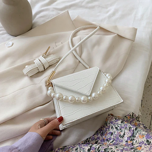 Conchita Handbags
